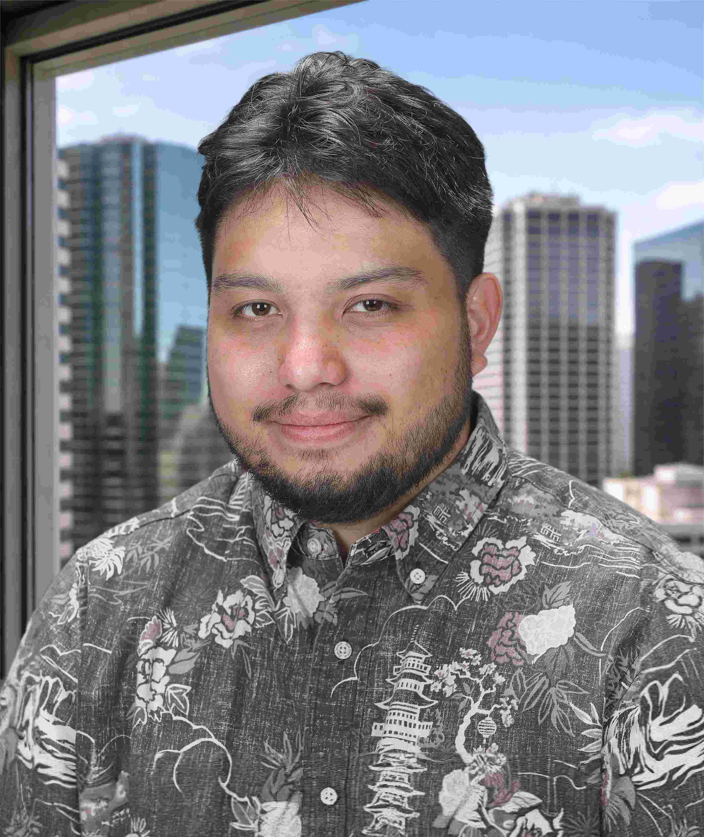 Professional headshot of Jeric Torres